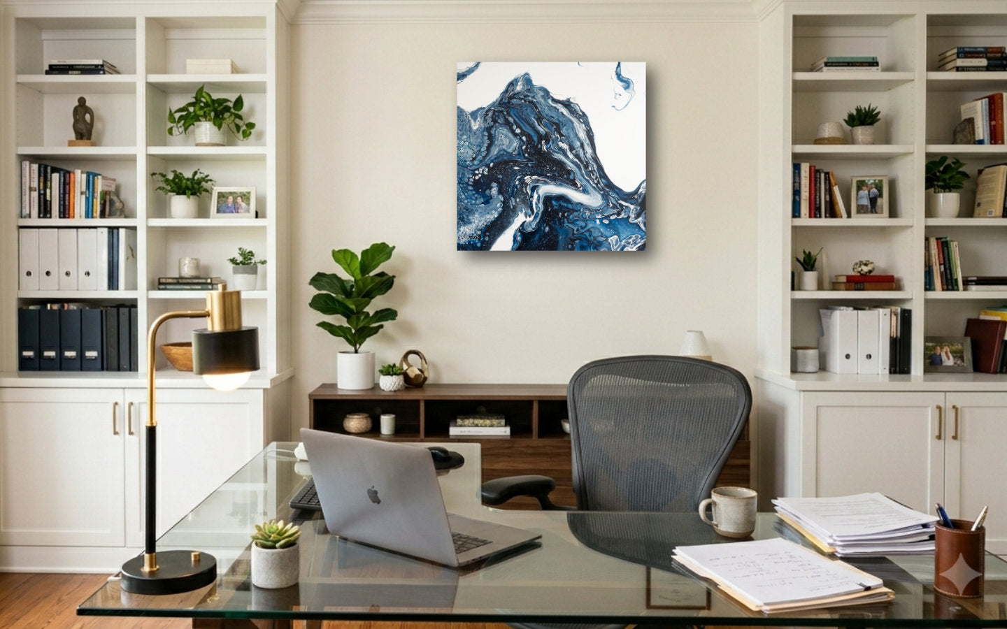 Square abstract acrylic painting in inky navy and white, a mass of ice breaking and churning into cold sea, glacier calving displayed in a study.