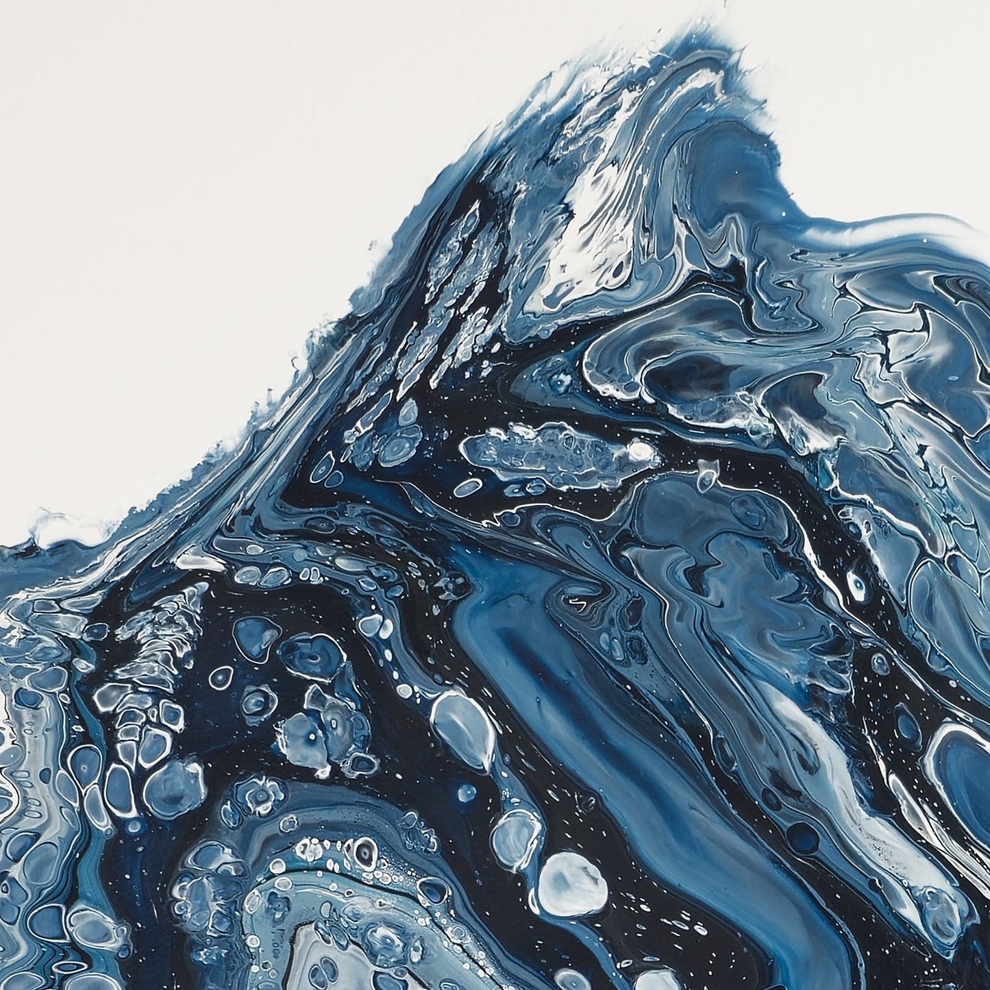 Fragment of square abstract acrylic painting in inky navy and white, a mass of ice breaking and churning into cold sea, glacier calving.