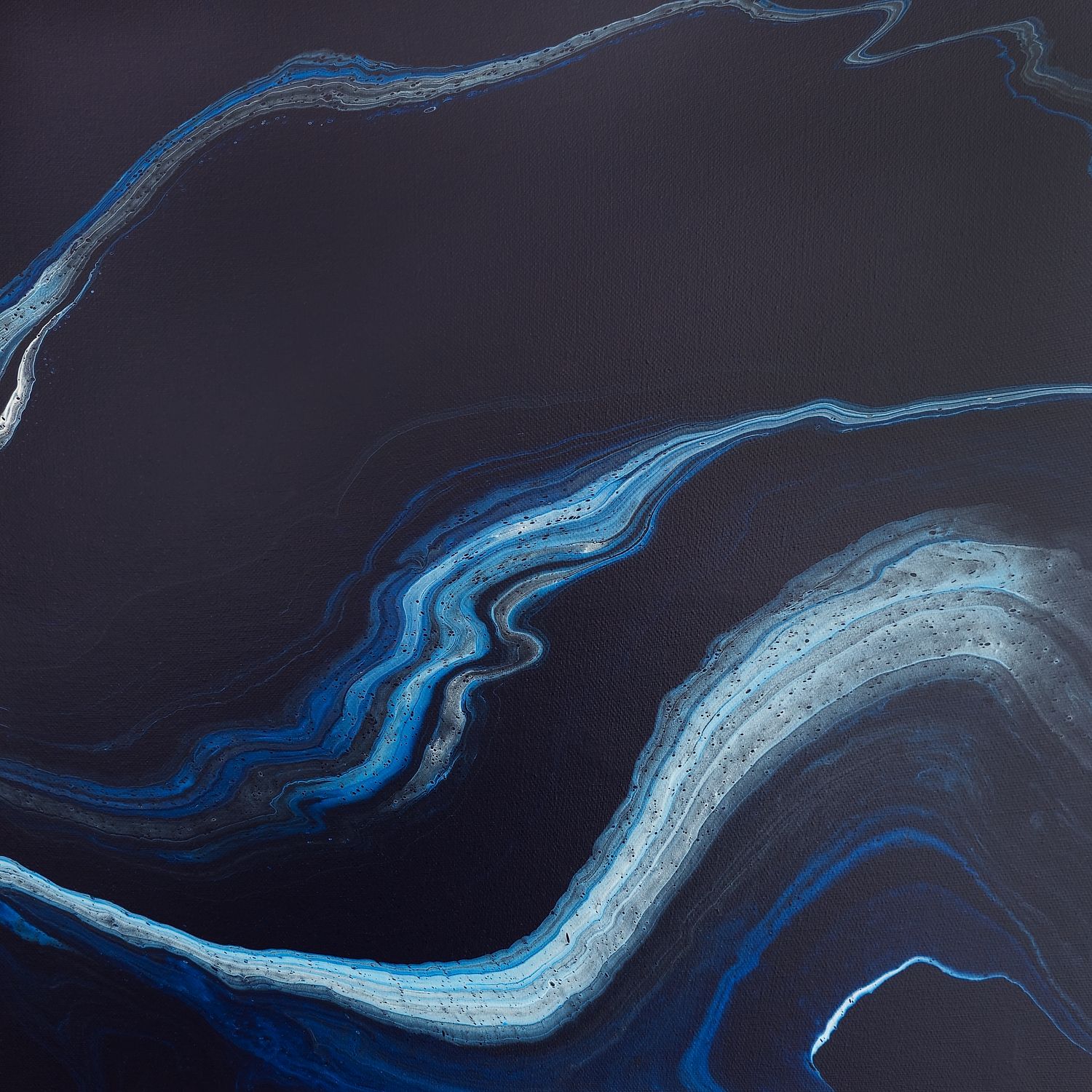 Abstract art print in near-black with bright ribbons of blue and silver light curving through, like bioluminescence in night surf