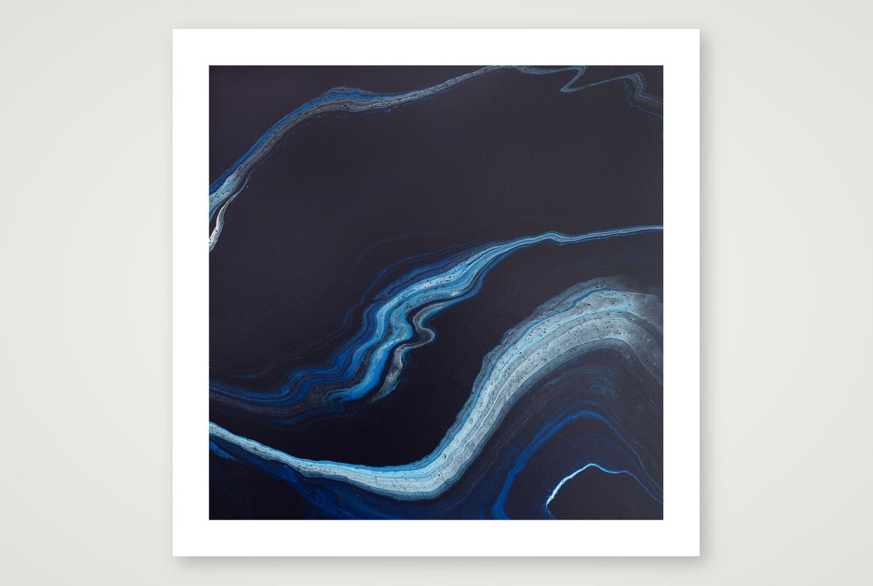 Abstract art print in near-black with bright ribbons of blue and silver light curving through, like bioluminescence in night surf