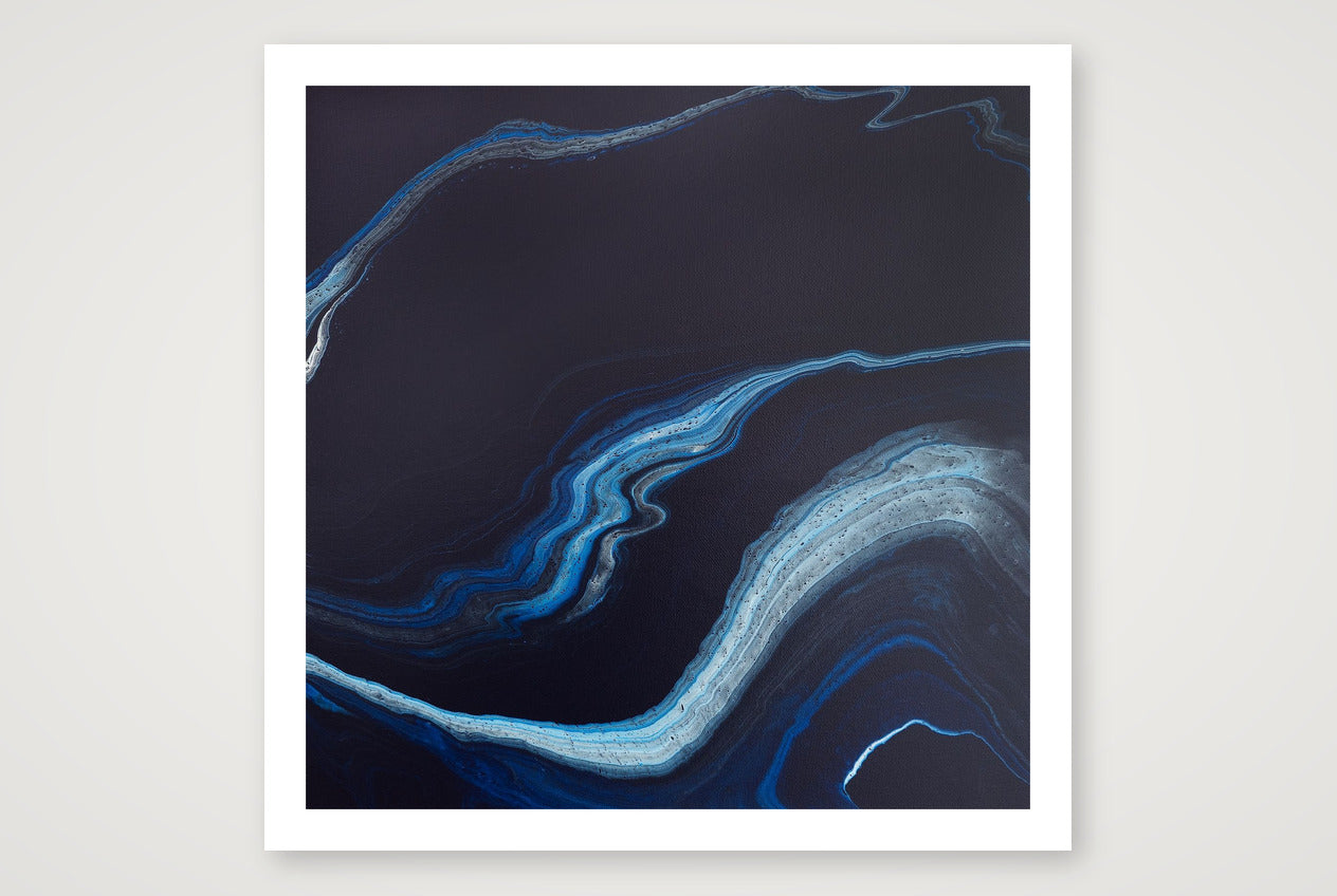 Abstract art print in near-black with bright ribbons of blue and silver light curving through, like bioluminescence in night surf