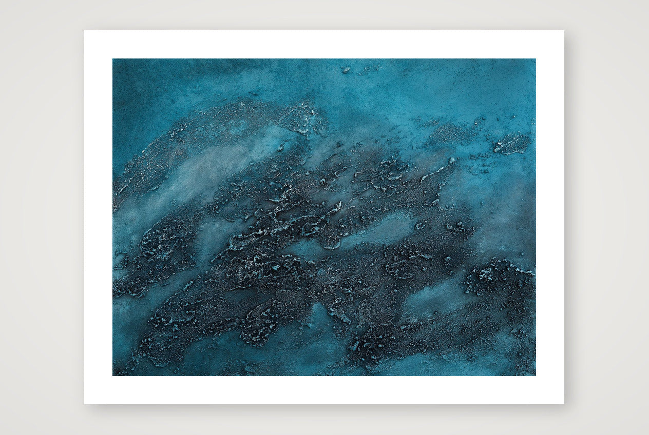 Landscape textured abstract acrylic painting in deep slate blue with a churning pale blue-white centre, heavily built-up crusted surface, weather crossing open water.
